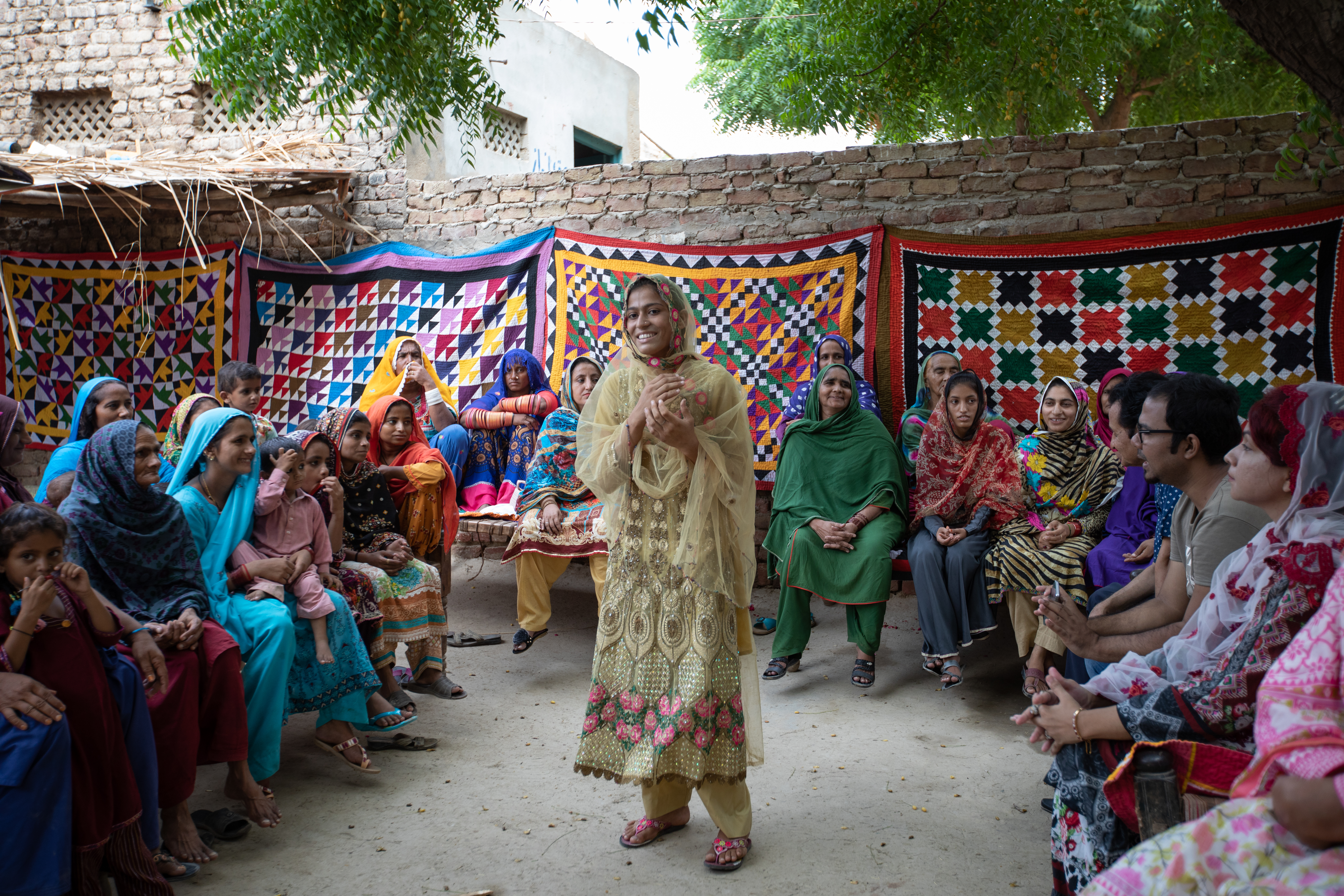 Samreen shares her stories outdoors, surrounded by her community.